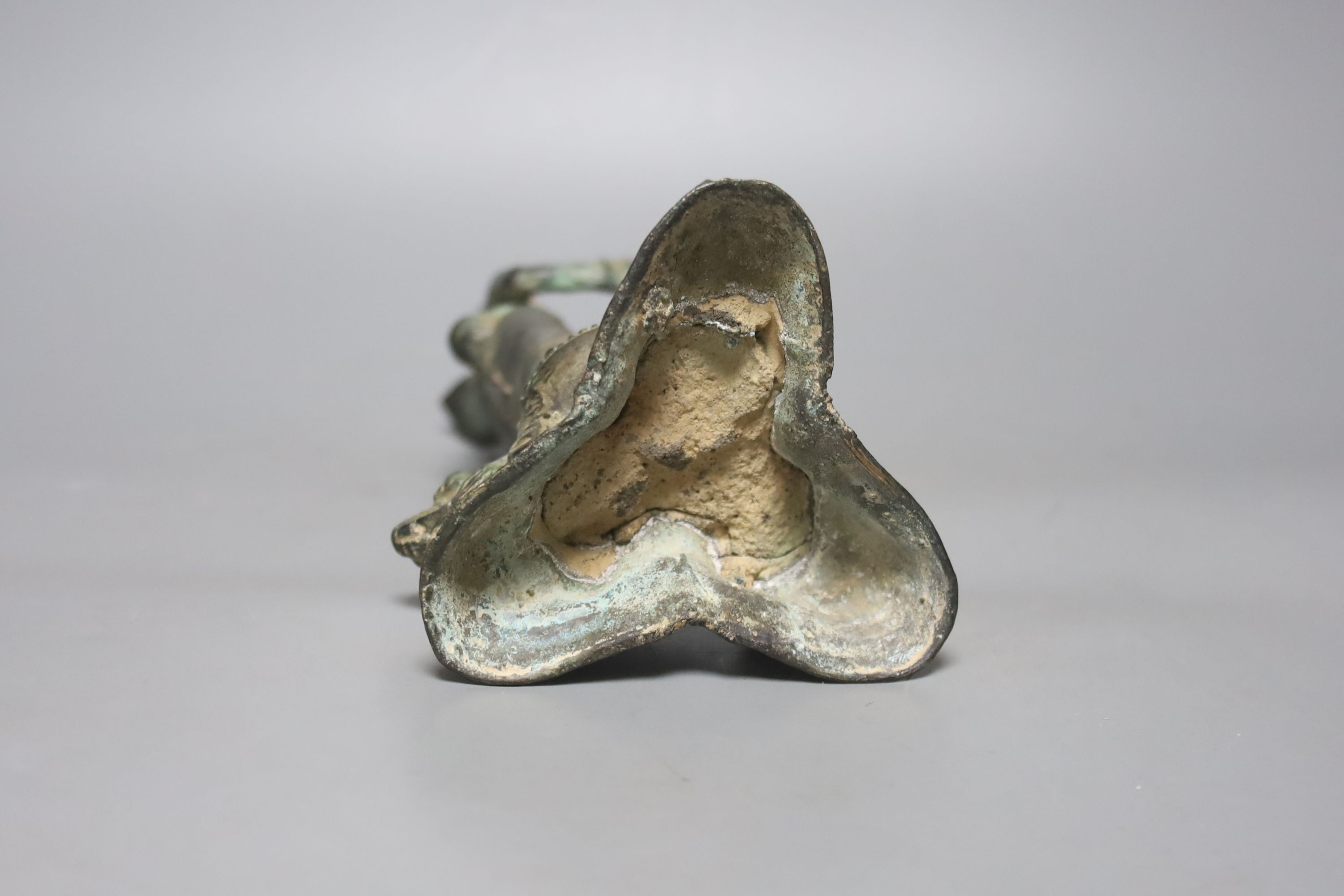 An Indian bronze figure of a standing Buddha, 25cm